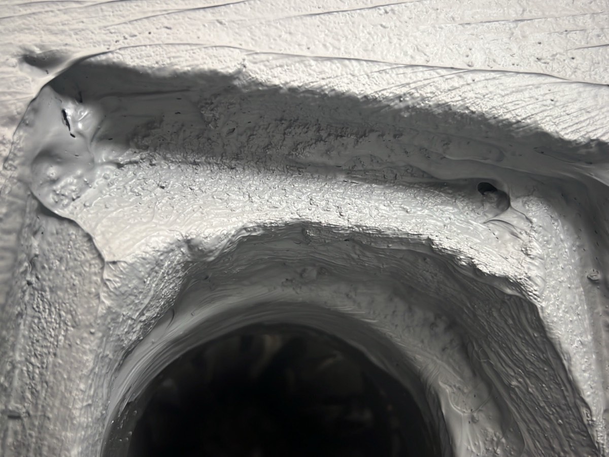 Screed and falls to a bathroom, recorded on a waterproofing inspection in Box Hill
